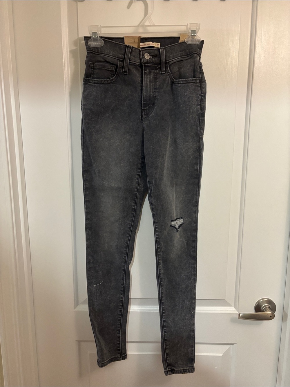 Levi's Black Washed Skinny Jeans with Distressed Knee